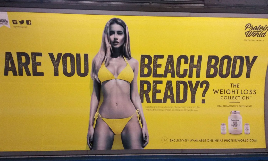 File photo dated 27/04/2015 of a Protein World advert displayed in an underground station in London which says "Are you beach body ready?'" as many of the posters have been defaced and a petition calling for their removal has gathered tens of thousands of signatures. PRESS ASSOCIATION Photo. Issue date: Tuesday April 28, 2015. See PA story HEALTH Body. Photo credit should read: Catherine Wylie/PA Wire